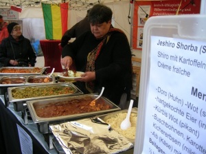Stordiau serving her food at an event in Germany
